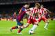 BARCELONA, SPAIN - MARCH 02: Leo Messi of FC Barcelona duels for the ball with Miguel Angel Garcia 'Corona' of UD Almeria during the La Liga match between FC Barcelona and UD Almeria at Camp Nou on March 2, 2014 in Barcelona, Spain. (Photo by Alex Caparr