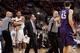 Ross is separated from a Northwestern player on Feb. 19 after shoving him. He was ejected from the game.