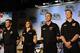 Jan 27, 2014; Charlotte, NC, USA; Stewart Haas team drivers from left to right, Tony Stewart (14) , Danica Patrick (10) , Kevin Harvick (4) and Kurt Busch (41) prepare to address the media during the Sprint Media Tour at the Charlotte Convention Center.