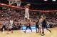 COLUMBUS, OH - FEBRUARY 11: Sam Thompson #12 of the Ohio State Buckeyes finishes off a fast break in the second half against the Michigan Wolverines with a slam dunk on February 11, 2014 at Value City Arena in Columbus, Ohio. Michigan defeated Ohio State