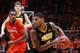 CHAMPAIGN, IL - FEBRUARY 1: Roy Devyn Marble #4 of the Iowa Hawkeyes looks to the basket against the Illinois Fighting Illini during the game at State Farm Center on February 1, 2014 in Champaign, Illinois. Iowa won the game 81-74. (Photo by Joe Robbins/