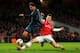 LONDON, ENGLAND - FEBRUARY 19: Laurent Koscielny of Arsenal tackles Claudio Pizarro of Bayern Muenchen during the UEFA Champions League Round of 16 first leg match between Arsenal and FC Bayern Muenchen at Emirates Stadium on February 19, 2014 in London,
