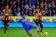 HULL, ENGLAND - JANUARY 11: Ashley Cole of Chelsea tackles Yannick Sagbo of Hull City during the Barclays Premier League match between Hull City and Chelsea at KC Stadium on January 11, 2014 in Hull, England. (Photo by Laurence Griffiths/Getty Images)