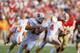 SAN FRANCISCO - NOVEMBER 18: Quarterback Chris Chandler #17 of the Tampa Bay Buccaneers runs with the ball during a game against the San Francisco 49ers at Candlestick Park on November 18, 1990 in San Francisco, California. The 49ers won 31-7. (Photo b