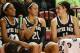Mar 2, 2014; Raleigh, NC, USA; Notre Dame Fighting Irish forward Ariel Braker (44), guard Kayla McBride (21), and forward Natilie Achonwa (11) talk on the bench during second half against the North Carolina State Wolfpack at Reynolds Coliseum. The Fighti