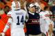 PASADENA, CA - JANUARY 06: Quarterback Nick Marshall #14 and head coach Gus Malzahn celebrate after a touchdown against the Florida State Seminoles in the second quarter of the 2014 Vizio BCS National Championship Game at the Rose Bowl on January 6, 2014