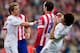 MADRID, SPAIN - MARCH 02: Diego Godin (2ndR) of Atletico de Madrid clashes with Pepe (R) of Real Madrid CF as Fabio Coentrao (L) reacts during the La Liga match between Club Atletico de Madrid and Real Madrid CF at Vicente Calderon Stadium on March 2, 201
