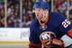 UNIONDALE, NY - FEBRUARY 27: Thomas Vanek #26 of the New York Islanders skates against the New York Islanders at the Nassau Veterans Memorial Coliseum on February 27, 2014 in Uniondale, New York. The Islanders defeated the Maple Leafs 5-4 in overtime. (P