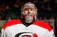 UNIONDALE, NY - OCTOBER 19: Cam Ward #30 of the Carolina Hurricanes skates against the New York Islanders at Nassau Veterans Memorial Coliseum on October 19, 2013 in Uniondale, New York. The Hurricanes defeated the Islanders 4-3. (Photo by Mike Stobe/NH