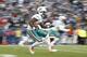 FOXBORO, MA - DECEMBER 24: Clyde Gates #10 of the Miami Dolphins looks for an opening on a runback during the second half of New England's 27-24 win at Gillette Stadium on December 24, 2011 in Foxboro, Massachusetts. (Photo by Winslow Townson/Getty Imag