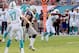 Dec 15, 2013; Miami Gardens, FL, USA; Miami Dolphins quarterback Ryan Tannehill (17) throws a pass to Miami Dolphins tight end Charles Clay (42) in the second half of the game against the New England Patriots at Sun Life Stadium. Miami defeated New Englan