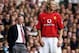 LONDON - APRIL 27: David Beckham of Manchester United and his manager Sir Alex Ferguson look in different directions during the FA Barclaycard Premiership match between Tottenham Hotspur and Manchester United held on April 27, 2003 at White Hart Lane, in