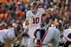 Nov 30, 2013; Auburn, AL, USA; Alabama Crimson Tide quarterback AJ McCarron (10) signals at the line of scrimmage during the first quarter against the Auburn Tigers at Jordan Hare Stadium. Mandatory Credit: John Reed-USA TODAY Sports