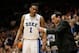 Feb 22, 2014; Durham, NC, USA; Duke Blue Devils head coach Mike Krzyzewski talks to forward Jabari Parker (1) on the sidelines against the Syracuse Orange at Cameron Indoor Stadium. Mandatory Credit: Mark Dolejs-USA TODAY Sports