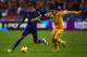 PARIS, FRANCE - NOVEMBER 19: Raphael Varane of France battles with Edmar De Lacerda of the Ukraine during the FIFA 2014 World Cup Qualifier Play-off second leg match between France and Ukraine at the Stade de France on November 19, 2013 in Paris, France.