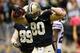 NEW ORLEANS, LA - OCTOBER 27: Jimmy Graham #80 of the New Orleans Saints celebrates after scoring a touchdown against the Buffalo Bills at Mercedes-Benz Superdome on October 27, 2013 in New Orleans, Louisiana. (Photo by Chris Graythen/Getty Images)