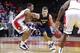 Nov 18, 2013; Piscataway, NJ, USA; Canisius Golden Griffins guard Billy Baron (12) drives to the basket during the first half against Rutgers Scarlet Knights guard Myles Mack (4) at the Louis Brown Athletic Center. Mandatory Credit: Jim O'Connor-USA TODA