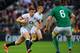 Title charge: Farrell gallops against Ireland.