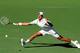 INDIAN WELLS, CA - MARCH 16: Novak Djokovic of Serbia hits a return to Juan Martin del Potro of Argentina during the men's semifinal match of day 11 of the BNP Paribas Open at Indian Wells Tennis Garden on March 16, 2013 in Indian Wells, California. (Ph