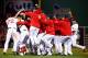 BOSTON, MA - OCTOBER 19: The Boston Red Sox celebrate after defeating the Detroit Tigers in Game Six of the American League Championship Series at Fenway Park on October 19, 2013 in Boston, Massachusetts. The Red Sox defeated the Tigers 5-2 to clinch the