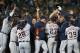 Oct 10, 2013; Oakland, CA, USA; Detroit Tigers players celebrate their victory over the Oakland Athletics in game five of the American League divisional series playoff baseball game at O.co Coliseum. The Detroit Tigers defeated the Oakland Athletics 3-0.
