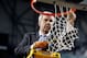DETROIT - APRIL 06: Head coach Roy Williams of the North Carolina Tar Heels cuts down a piece of the net after they 89-72 win against the Michigan State Spartans during the 2009 NCAA Division I Men's Basketball National Championship game at Ford Field on