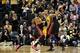 Dec 10, 2013; Indianapolis, IN, USA; Miami Heat center Chris Bosh (1) sets a pick for guard Mario Chalmers (15) as he drives to the basket against Indiana Pacers guard George Hill (3) at Bankers Life Fieldhouse. Indiana defeats Miami 90-84. Mandatory Cre