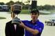 MIAMI, FL - MARCH 11: Justin Rose of England holds the Gene Sarazen Cup awarded to the winner after the final round of the World Golf Championship Cadillac Championship on the TPC Blue Monster Course at Doral Golf Resort And Spa on March 11, 2012 in Miam
