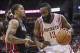 Mar 4, 2014; Houston, TX, USA; Houston Rockets shooting guard James Harden (13) drives to the basket during the second quarter as Miami Heat small forward Michael Beasley (8) defends at Toyota Center. Mandatory Credit: Troy Taormina-USA TODAY Sports