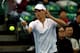 HONG KONG - MARCH 03: Tomas Berdych of Czech Republic plays a shot against Lleyton Hewitt of Australia during the BNP Paribas Showdown on World Tennis Day at the Hong Kong Velodrome on March 3, 2014 in Hong Kong, Hong Kong. (Photo by Stanley Chou/Getty