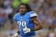 DETROIT, MI - NOVEMBER 24: Willie Young #79 of the Detroit Lions runs off the field after losing his helmet during the last play of the third quarter during the game against the Tampa Bay Buccaneers at Ford Field on November 24, 2013 in Detroit, Michigan