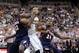 Mar 1, 2014; East Lansing, MI, USA; Illinois Fighting Illini forward/center Nnanna Egwu (32) and Michigan State Spartans forward Adreian Payne (5) and Illinois Fighting Illini guard Rayvonte Rice (24) fight for position during the 2nd half of a game at Ja