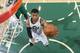 SALT LAKE CITY, UT - FEBRUARY 24: Trey Burke #3 of the Utah Jazz shoots a layup against the Boston Celtics at EnergySolutions Arena on February 24, 2014 in Salt Lake City, Utah. NOTE TO USER: User expressly acknowledges and agrees that, by downloading an