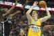 Feb 27, 2014; Denver, CO, USA; Denver Nuggets center Timofey Mozgov (25) shoots the ball during the first half against the Brooklyn Nets at Pepsi Center. Mandatory Credit: Chris Humphreys-USA TODAY Sports
