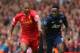 LIVERPOOL, ENGLAND - SEPTEMBER 01: Glen Johnson of Liverpool competes with Danny Welbeck of Manchester United during the Barclays Premier League match between Liverpool and Manchester United at Anfield on September 01, 2013 in Liverpool, England. (Photo