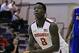 Jae'Sean Tate bends deeply on a free throw.