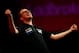 LONDON, ENGLAND - DECEMBER 27: Mark Webster of Wales celebrates victory in his third round match against Raymond van Barneveld of Holland on day twelve of the Ladbrokes.com World Darts Championship at Alexandra Palace on December 27, 2013 in London, Engl
