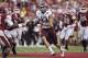 FAYETTEVILLE, AR - SEPTEMBER 28: Mike Evans #13 of the Texas A&M Aggies runs the ball against the Arkansas Razorbacks at Razorback Stadium on September 28, 2013 in Fayetteville, Arkansas. The Aggies defeated the Razorbacks 45-33. (Photo by Wesley Hitt/