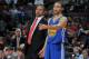 AUBURN HILLS, MI - FEBRUARY 24: Mark Jackson, Head Coach of the Golden State Warriors and Stephen Curry #30 talk during the game against the Detroit Pistons on February 24, 2014 at The Palace of Auburn Hills in Auburn Hills, Michigan. NOTE TO USER: User e