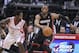 Mar 4, 2014; Houston, TX, USA; Miami Heat shooting guard Dwyane Wade (3) controls the ball during the second quarter as Houston Rockets point guard Patrick Beverley (2) defends at Toyota Center. Mandatory Credit: Troy Taormina-USA TODAY Sports
