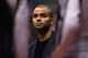 LOS ANGELES, CA - FEBRUARY 18: Tony Parker of the San Antonio Spurs looks on from the bench against the Los Angeles Clippers in the first half at Staples Center on February 18, 2014 in Los Angeles, California. NOTE TO USER: User expressly acknowledges an