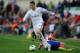 MADRID, SPAIN - MARCH 02: Cristiano Ronaldo (L) of Real Madrid CF beats Raul Garcia of Club Atletico de Madrid during the La Liga match between Club Atletico de Madrid and Real Madrid CF at Vicente Calderon Stadium on March 2, 2014 in Madrid, Spain. (P