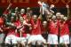 MOSCOW - MAY 21: Manchester United players celebrate with the trophy following their team's victory during the UEFA Champions League Final match between Manchester United and Chelsea at the Luzhniki Stadium on May 21, 2008 in Moscow, Russia. (Photo by Jul