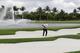 Tiger Woods hit from bunkers at TPC Doral Blue Monster Wednesday afternoon