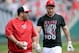 WASHINGTON, DC - JUNE 23: Bryce Harper #34 of the Washington Nationals (R) talks with Nationals batting practice pitcher Ali Modami before a game between the Nationals and Colorado Rockies at Nationals Park on June 23, 2013 in Washington, DC. Harper has