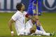 LARNACA, CYPRUS - MARCH 05: Roman Bezus (R) of the Ukraine stands over Clint Dempsey of the USA during the Ukraine v USA International Friendly at Antonis Papadopoulos stadium on March 5, 2014 in Larnaca, Cyprus. (Photo by Andrew Caballero-Reynolds/Get