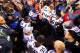 Feb 2, 2014; East Rutherford, NJ, USA; Seattle Seahawks quarterback Russell Wilson (3) kneels in prayer with his teammates after Super Bowl XLVIII against the Denver Broncos at MetLife Stadium. Mandatory Credit: Mark J. Rebilas-USA TODAY Sports