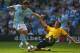 MANCHESTER, ENGLAND - APRIL 19: Elano of Manchester City is tackled by Jonas Olsson of West Bromwich Albion to concede a penalty during the Barclays Premier League match between Manchester City and West Bromwich Albion at the City of Manchester Stadium o