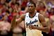 LAWRENCE, KS - JANUARY 18: Joel Embiid #21 of the Kansas Jayhawks reacts after scoring during the game against the Oklahoma State Cowboys at Allen Fieldhouse on January 18, 2014 in Lawrence, Kansas. (Photo by Jamie Squire/Getty Images)