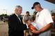SPRINGFIELD, MA - SEPTEMBER 7: Hall of Fame inductee Roy Williams (L) signs an autograph during the Naismith Basketball Hall of Fame reception prior to the Induction Ceremony on September 7, 2007 at the Naismith Basketball Hall of Fame in Springfield, Ma